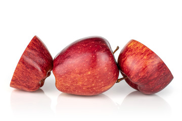 Group of one whole two halves of fresh apple red delicious isolated on white background