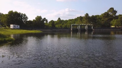 FLYING OVER A DAM SUNNY DAY