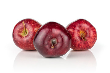 Group of three whole fresh apple red delicious the top is facing front isolated on white background