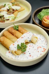 Pancakes with fish salmon, caviar and cream sauce. Restaurant menu