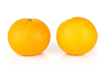 Group of two whole fresh sweet orange isolated on white background