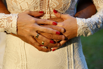 Bride and Groom Hands and Wedding Rings - Wedding Rings