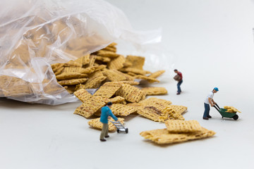 Miniature Construction Workers/People Working around Cereal - Powered by Adobe