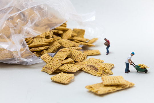 Miniature Construction Workers/People Working around Cereal