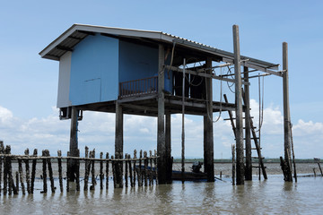 fisherman's house on sea