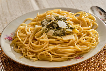 Spaghetti with basil pesto sauce