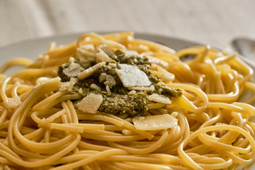 Spaghetti with basil pesto sauce