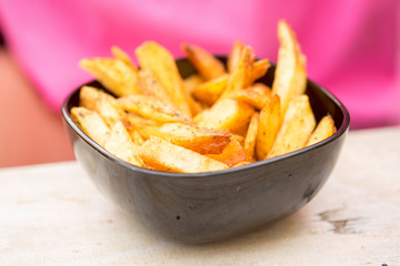 Real potato chips in bowl 