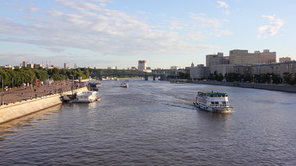 Top view of Pushkin embankment, St. Andrew's bridge in Gorky Park and the Moscow river with ships...