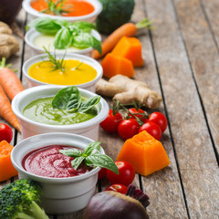 Set of seasonal fall autumn creamy soups on a table