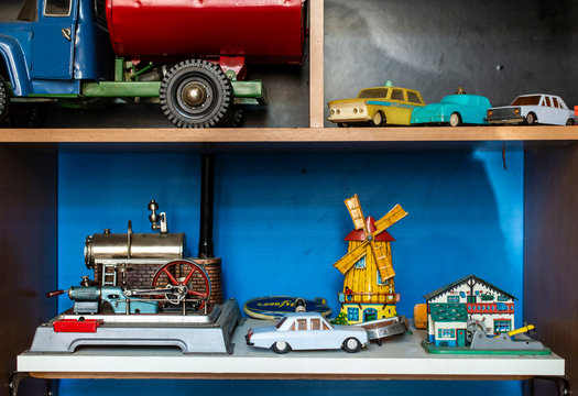 Old vintage toys on shelf.