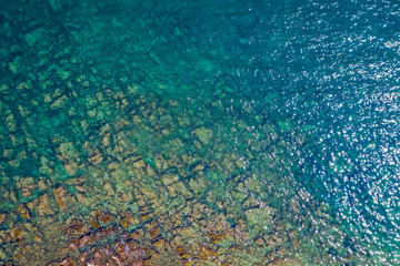 Fototapeta na wymiar Aerial view of turquoise sea water.