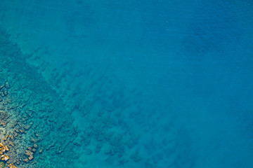 Aerial view of turquoise sea water.