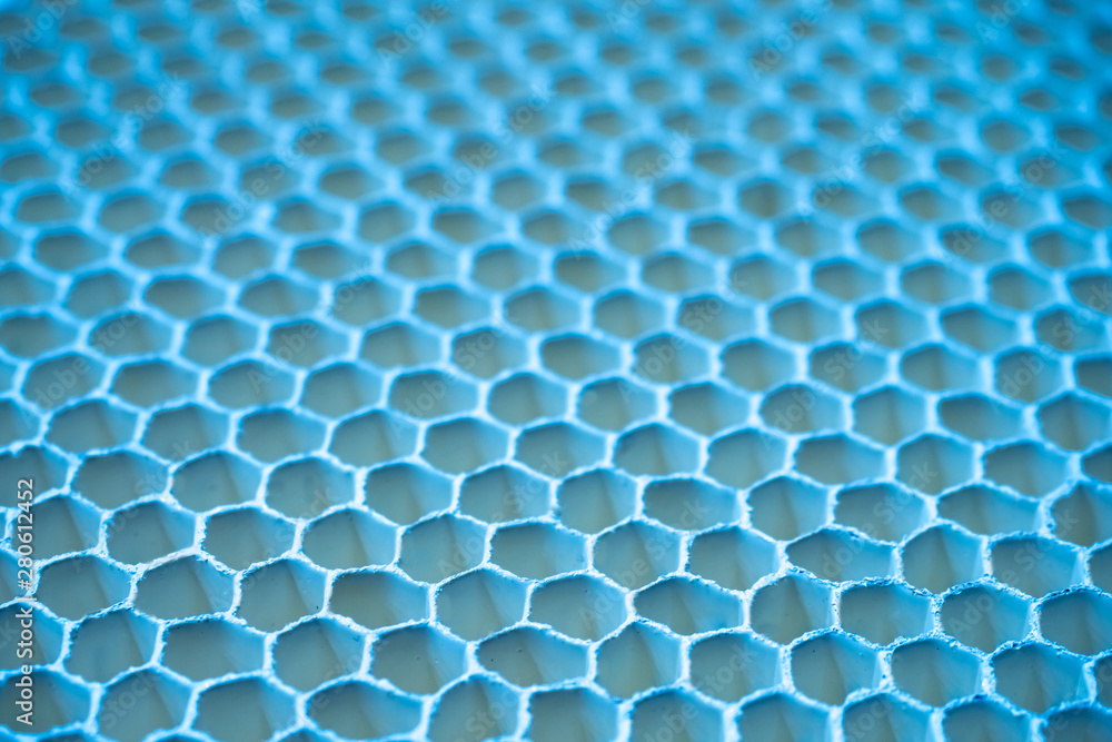 Poster the concept of cells. hexagonal cells in the future. background with a repeating pattern. blue patte