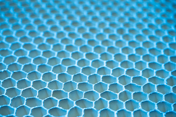 The concept of cells. Hexagonal cells in the future. Background with a repeating pattern. Blue...