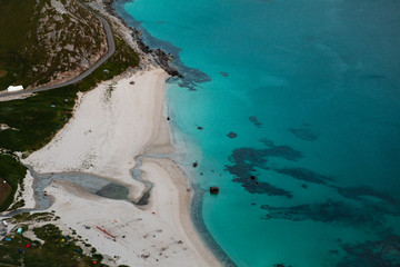 aerial view of beach and turquoise water