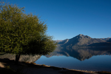 Lakeside view of calm Epuyen lake in Puerto Patriada, Patagonia, Argentina