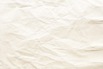 Old pale yellow crumpled paper background texture