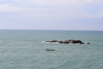 Fototapeta premium People Sea Rock