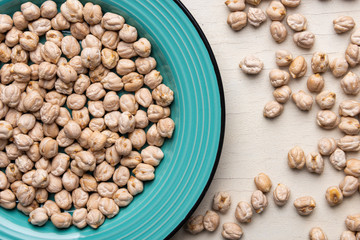 Chickpeas in the blue plate on the table