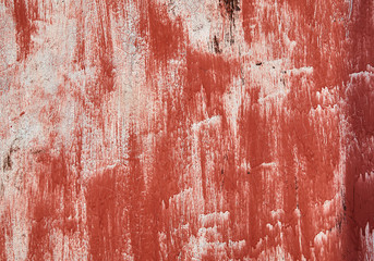 Texture on old wall with red paint with copy space