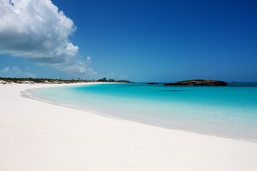 Beautiful white sand beach and clear turquoise sea water in Great Exuma island, Bahamas 