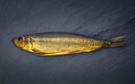Kipper, smoked fish on a slate plate