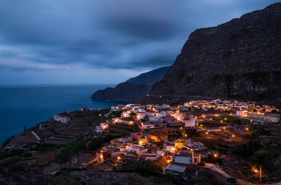 Village of Agulo at night, at  back steep coast Agulo, La Gomera, Canary Islands, Spain, Europe