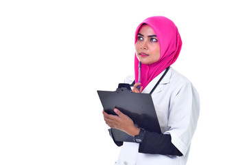 Doctor taking notes on a clipboard