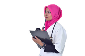 Doctor taking notes on a clipboard