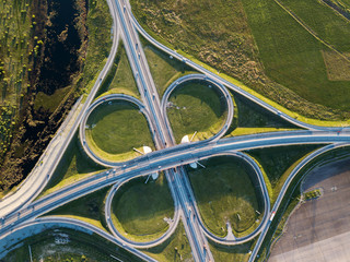 Summer aerial photo of transport junction, traffic cross road junction day view from above