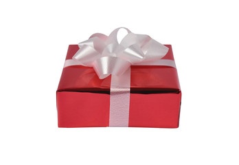 Red gift box and ribbon bow on white background. Concept for Valentine day, Christmas present and New Year.