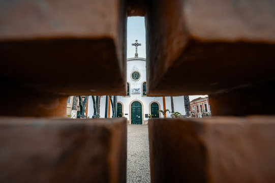 Picture of church taken through the brick hole, Angola