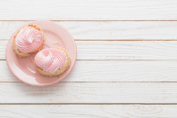 cakes on  white wooden background