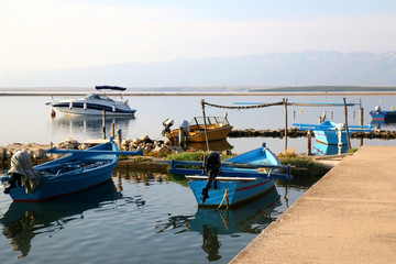 Fototapeta na wymiar Traditional colorful wooden boats in port of Nin, Croatia.