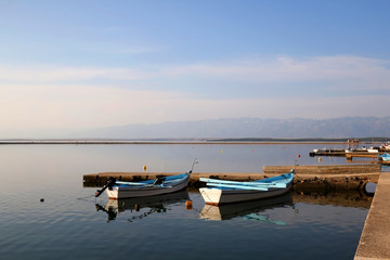 Obraz premium Traditional colorful wooden boats in port of Nin, Croatia.