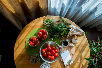 Fresh tomato and ingredients for conservation. Preparation marinated salted tomato