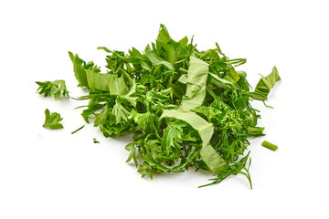 Sliced parsley and basil, ingredients for cooking, isolated on white background