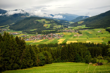 Beautiful aerial view of Valdaora (Olang) near Brunico (BZ) as seen from the road for Passo Furcia....