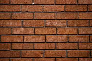 Orange brick wall pattern vintage grunge background texture