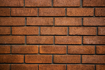 Orange brick wall pattern vintage grunge background texture