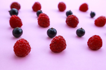 Fresh berries on color background