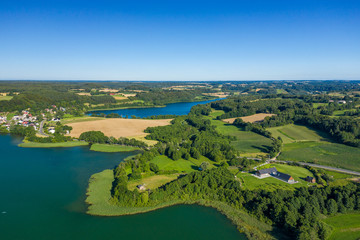 Aerial view of Kashubian Landscape Park. Kaszuby. Poland. Photo made by drone from above. Bird eye view.