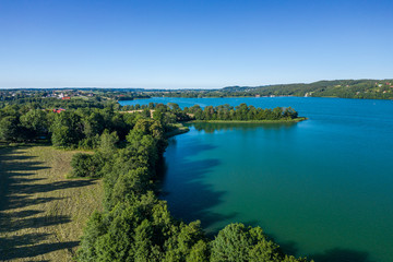 Fototapeta premium Aerial view of Kashubian Landscape Park. Kaszuby. Poland. Photo made by drone from above. Bird eye view.