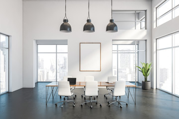 White meeting room interior with poster