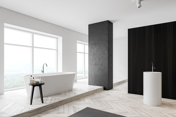 White and dark wooden bathroom corner with tub