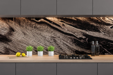 Black marble kitchen with gray countertops
