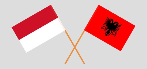 Albania and Indonesia. Crossed Albanian and Indonesian flags