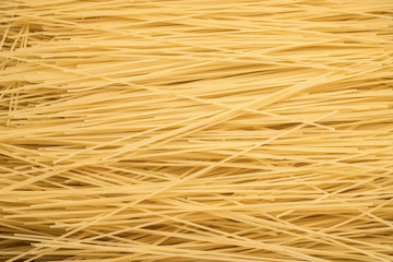Spaghetti pasta in in quantities - macaroni texture