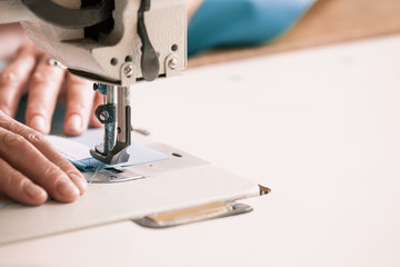 Woman using sewing machine